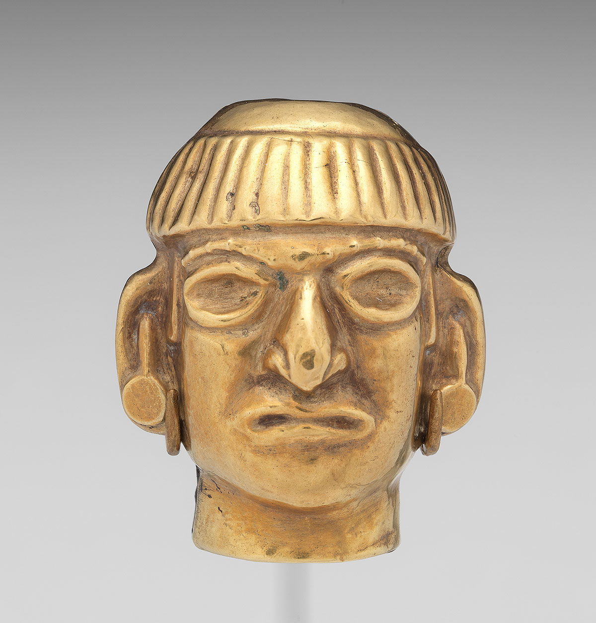 Moche culture, head-form bead 3rd - 7th century.