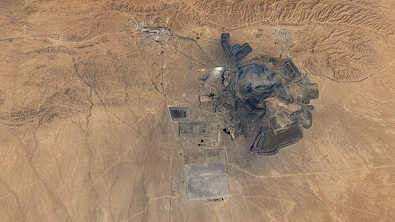 Muruntau gold mine in Uzbekistan. One of the world's biggest gold mines; open-pit heap leaching gold extraction, in operation since 1967; Satellite image from 2022 (Nasa).